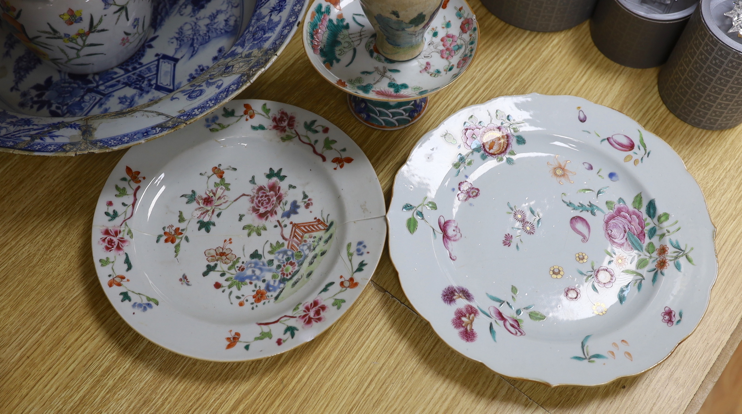 An 18th century Chinese blue and white basin, two plates, and an early 20th century Chinese teapot, footed dish and a vase (6)